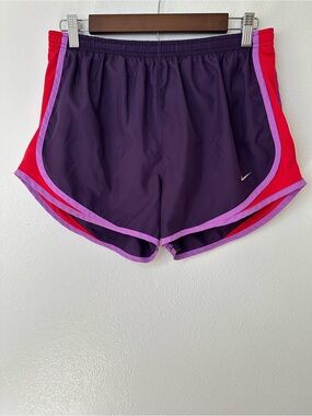 Nike Women's Purple Athletic Shorts with Pink Trim and Red Side Panels